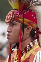 Young First Nations man in traditional regalia