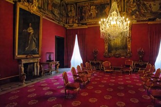 View from throne of Grand Master into historic Ambassadorial Hall with large luminous chandelier in Grand Masters Palace Palace of Knights of Malta Knights of Malta historic Order of St John