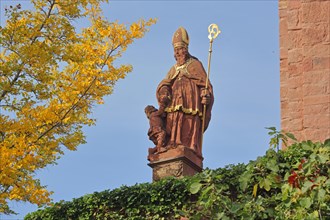 Patron Saint St. Martin with crook and mitre at the church of St. Martin
