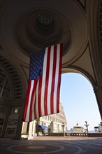 American flag in the arch of Rowes Wharf