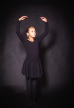 Young ballet dancer in basic position