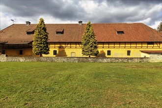 Yellow-painted farm building