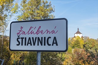Stiavnica in love city sign with New Castle in background