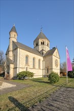 Protestant neo-Romanesque church and flag