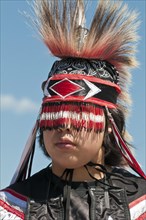 Young Blackfoot boy in traditional regalia