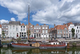 Townscape with traditional flat-bottomed sailing boat at Bierkaai
