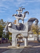 The large sculpture Tower of the Grey Horses on Hillerplatz