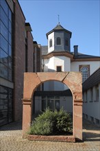 Historic archway with St. Francis Church in Kelkheim