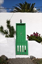 House with green door on the beach of Playa Quemada