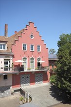 Red building with stepped gable from the rowing club crv 1876