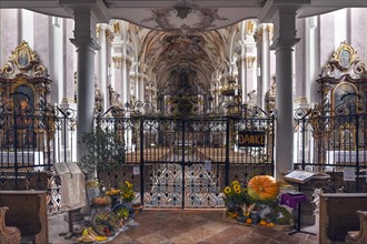 Harvest decoration in front of the baroque interior of the former monastery church of St. Margareta