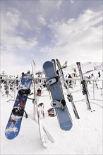 Snowboards and skis on a rack at Canada Olympic Park
