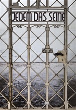 Gate to the beech forest concentration camp with the saying Jedem das Seine