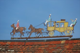 Historic horse-drawn carriage with stagecoach on the ridge of the Rettershof