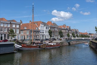 Townscape with traditional flat-bottomed sailing boat at Bierkaai