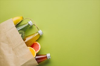 Flatlay paper bag with fruit juices