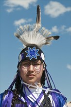 Blackfoot boy in traditional regalia