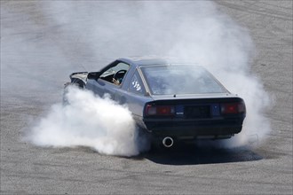 Car performing a skid test