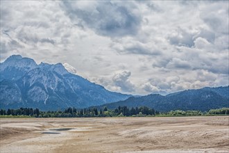 View over the drained and empty Forggensee lake