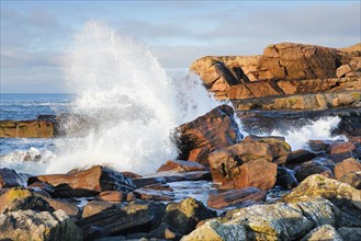 Water dashing against rocks on the rocky coast of Isle of Skye