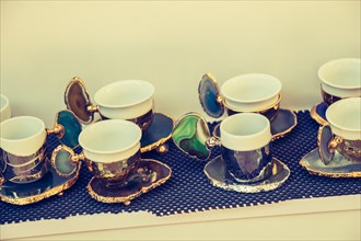 Hand made multicolor Turkish coffee cups in market