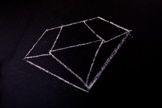 Chalk drawn diamond on a blackboard in the view