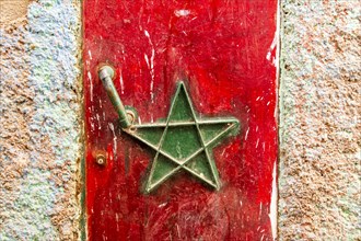 Moroccan flag painted on the door to house in Moulay Idriss