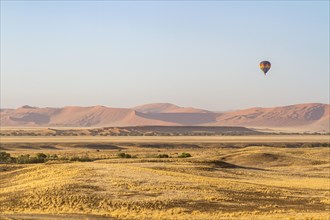 Hot air balloon over dune landscape of Sossusvlei