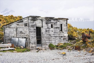 Wooden shack with sheet roof and no door in Ushuaia