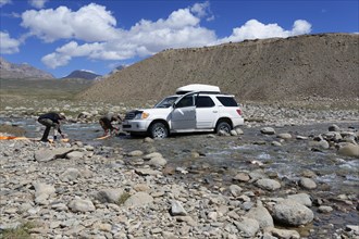 Vehicle stuck while crossing a river