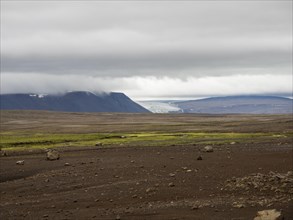 Glaciers and barren volcanic landscape