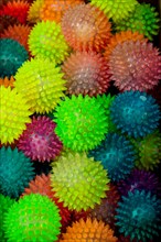 Colorful plastic balls for entertainment as a background