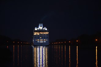 Cruise ship Sirena at night in the Kiel Canal