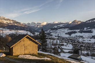 View of the snow-covered Churfirsten in the evening light