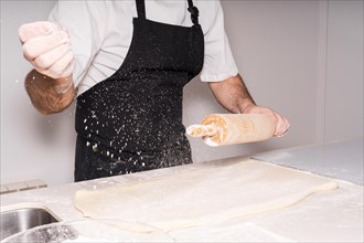 Man baking homemade croissants