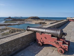 Cannon on the city wall and offshore islands