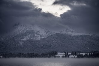 Hopfensee with cloudy sky at blue hour