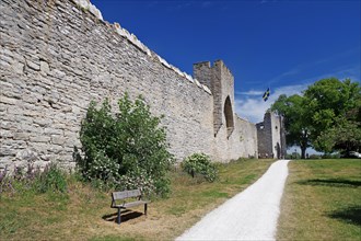 Path along medieval city walls and towers