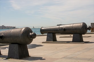 Antique Ottoman canons facing the sea in the view