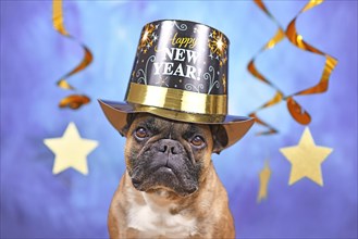 French Bulldog dog wearing New Year's Eve party top hat with text 'Happy new year' in front of blue background with golden garlands