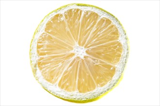 Cut of yellow lemon on white background. France