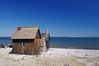 Old fisherman's house on a barren beach
