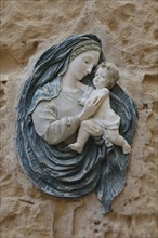 Madonna with Child on a House Wall