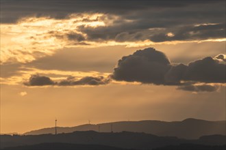 Wind turbines on the mountains of the Black Forest at dawn. Freiburg brisgau