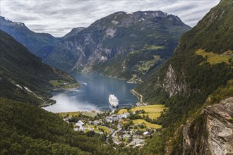 View from the mountain to the village of Geirang at the Geirangerfjord in Norway Fjord
