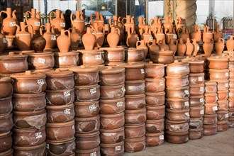 Harden clay pot showing for sale in a market