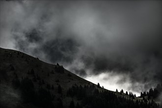 Mountain ridge with dramatic clouds