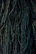 Natural wool thread dyed in color for carpet making