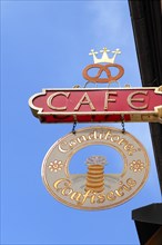 Old hanging sign of a cafe