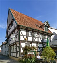 Residential and commercial building in half-timbered construction